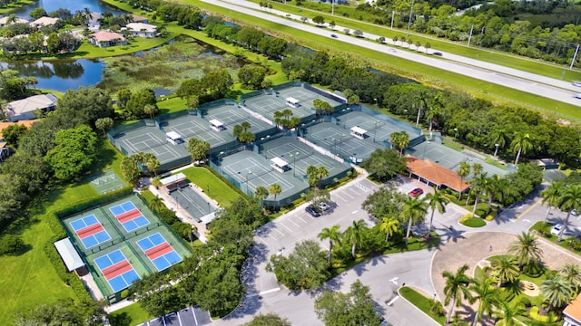 birds eye view of property featuring a water view