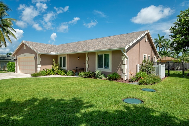 ranch-style house with a front lawn and a garage