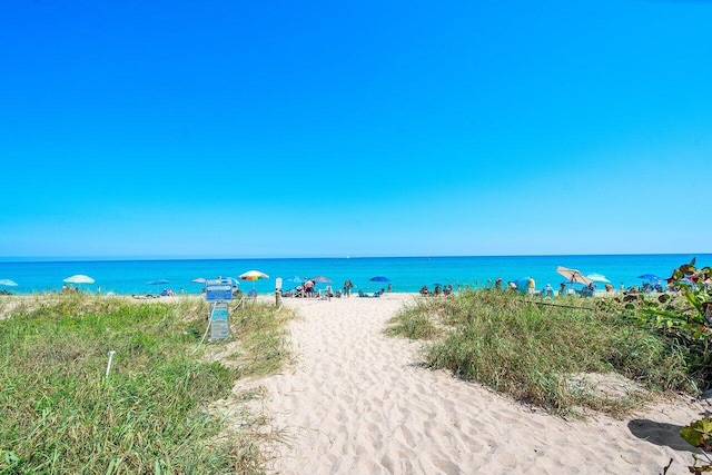 water view featuring a beach view