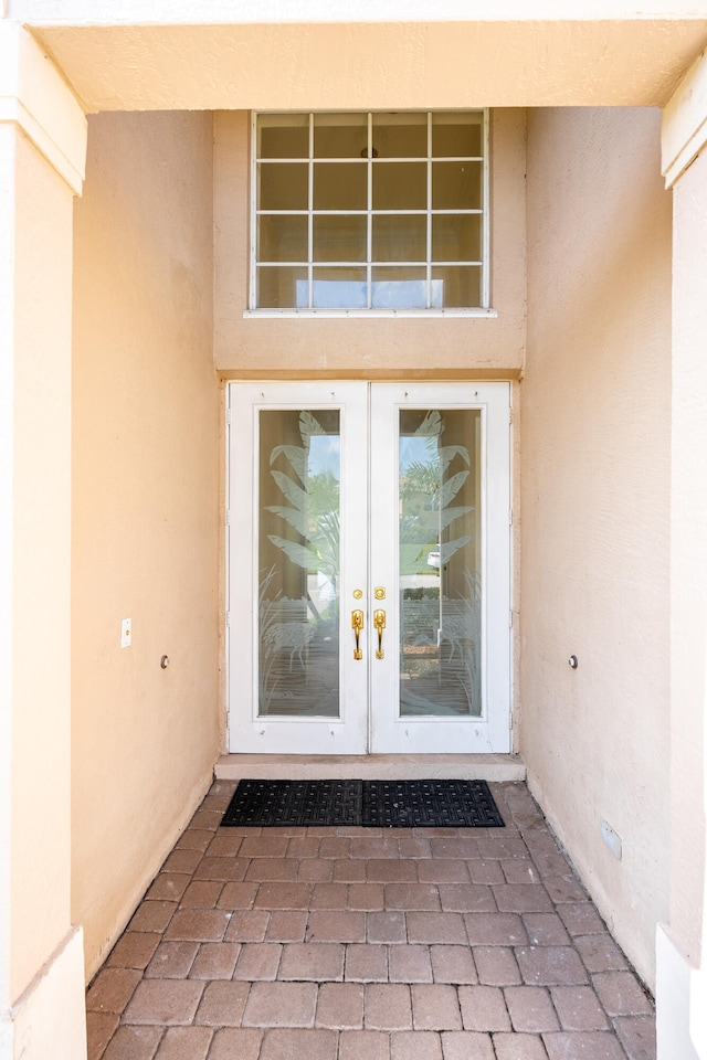 entrance to property featuring french doors