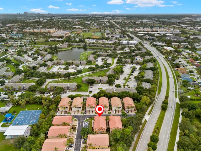 bird's eye view with a water view