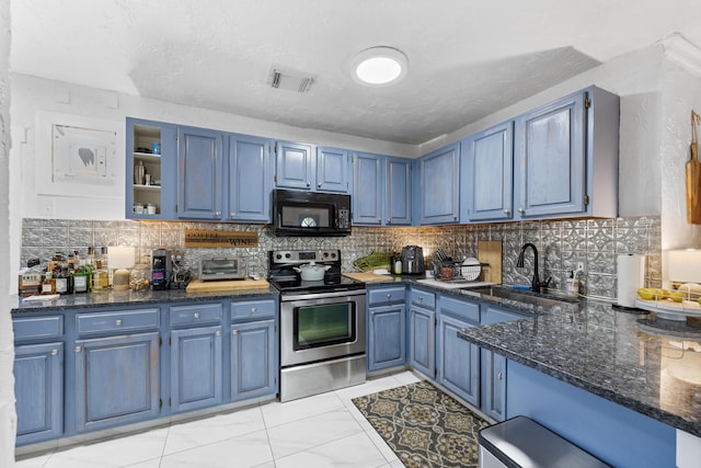 kitchen featuring decorative backsplash, blue cabinets, sink, and stainless steel electric range