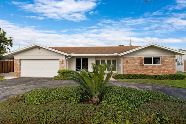 ranch-style house with a garage