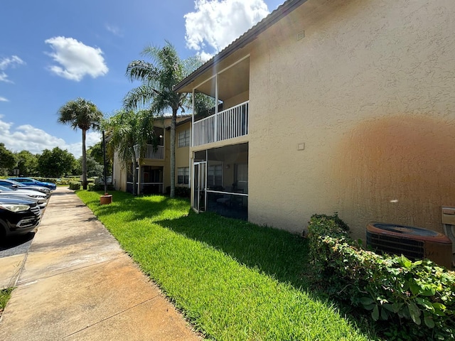 view of property with central AC unit