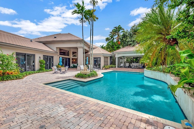 view of pool with a patio area