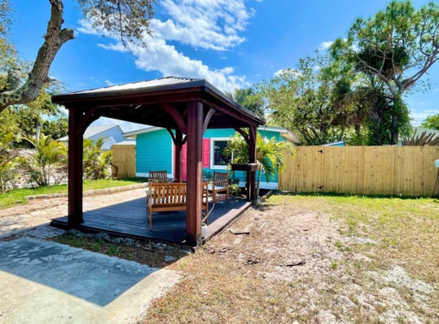 view of yard featuring a gazebo and a deck