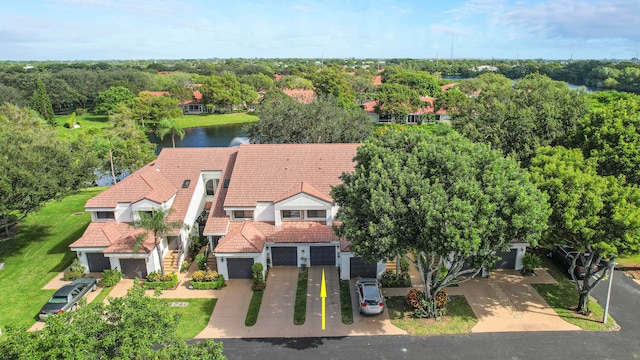 drone / aerial view with a water view