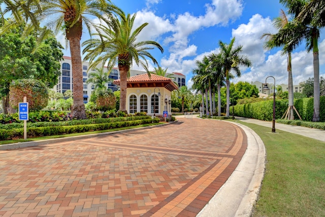 view of front of house featuring a tile roof and stucco siding