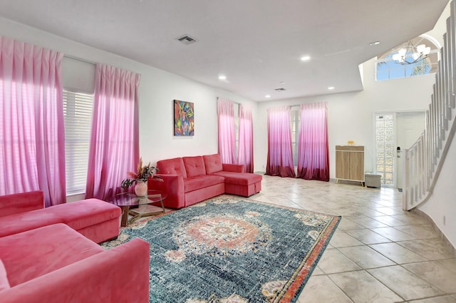 living room featuring a chandelier, tile patterned flooring, recessed lighting, visible vents, and stairway