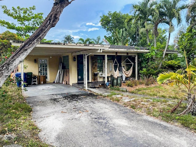 view of front of house with a carport