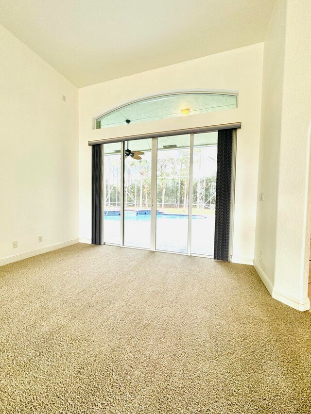 empty room featuring a healthy amount of sunlight and carpet flooring