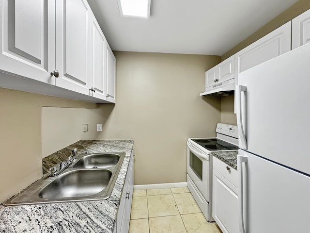 kitchen with sink, white cabinets, white appliances, and light tile patterned floors