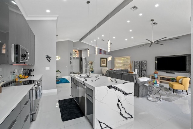 kitchen with gray cabinets, light tile patterned floors, stainless steel appliances, and ceiling fan