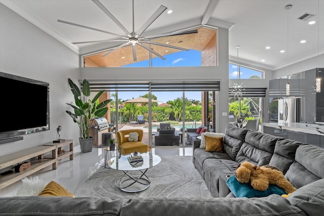 tiled living room with an inviting chandelier and high vaulted ceiling