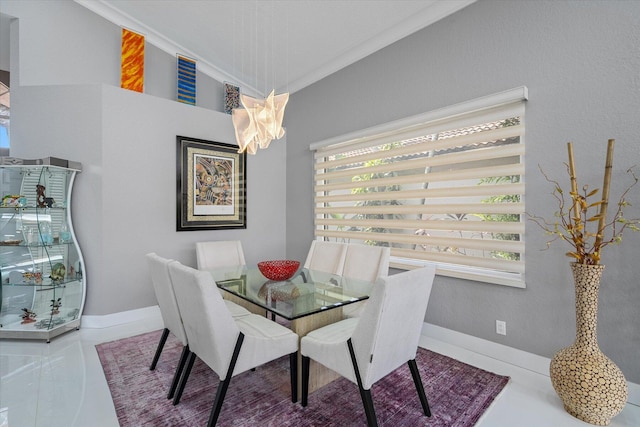 tiled dining room with crown molding