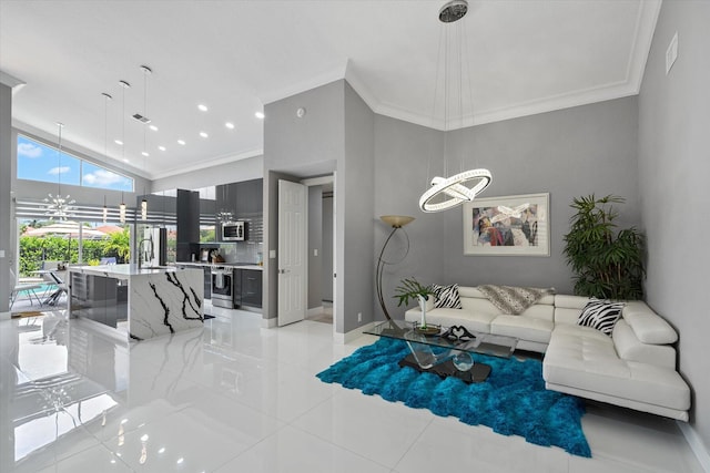 tiled living room with crown molding, high vaulted ceiling, sink, and a notable chandelier