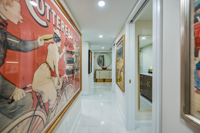 hall featuring light tile patterned floors