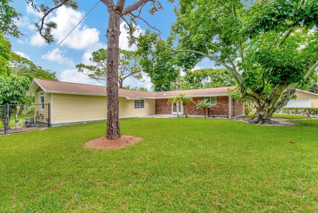 view of front of property with a front lawn