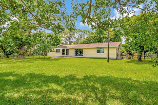 exterior space with a yard