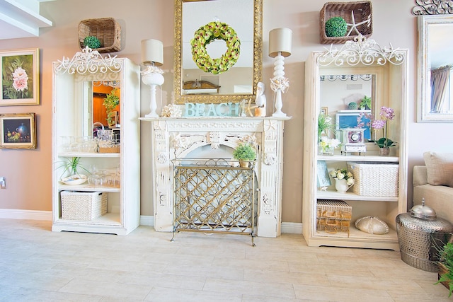 bar with baseboards and wood tiled floor