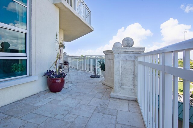 view of patio / terrace featuring a balcony