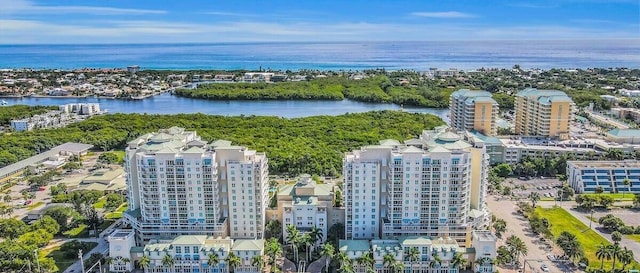 aerial view with a water view and a city view