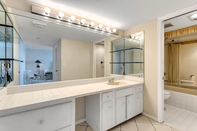 full bathroom featuring shower / tub combination, toilet, visible vents, vanity, and tile patterned floors