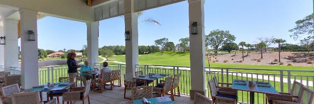 view of patio with a balcony