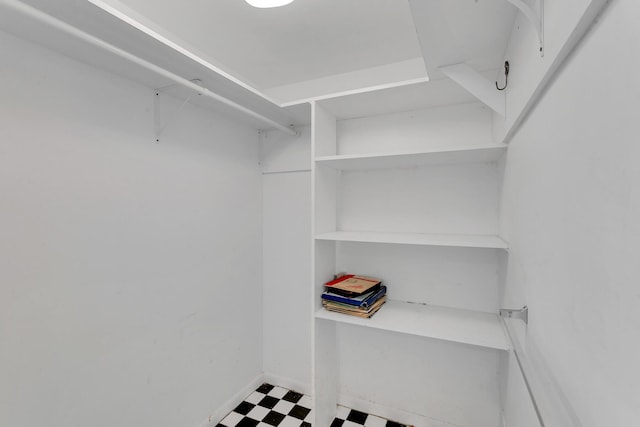 spacious closet featuring tile patterned floors