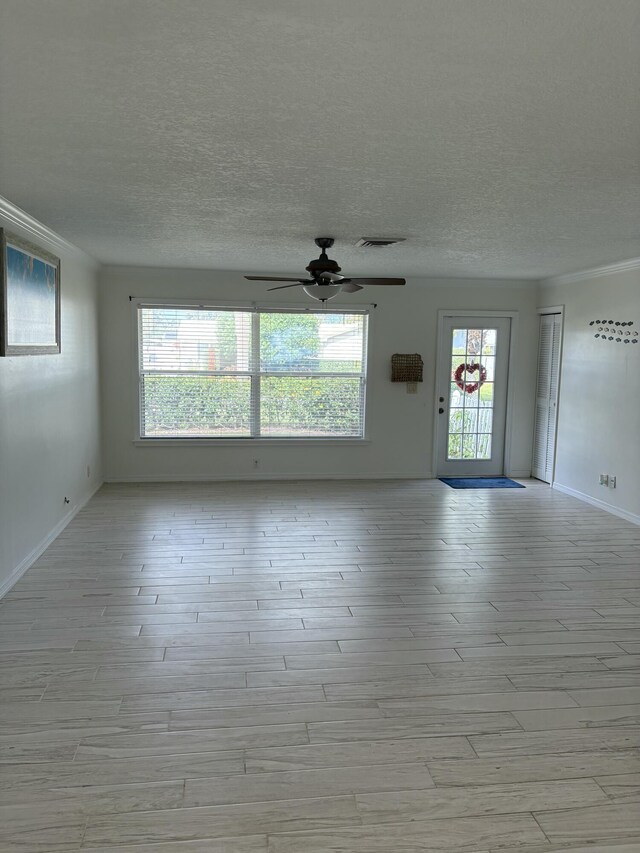 living room with ceiling fan with notable chandelier and light hardwood / wood-style floors