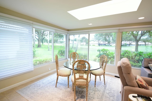 sunroom featuring a skylight