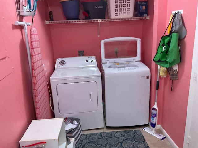 washroom with separate washer and dryer