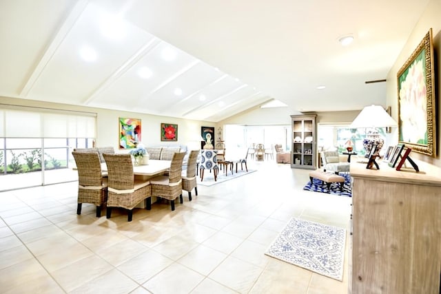 dining space featuring recessed lighting, light tile patterned floors, and lofted ceiling with beams