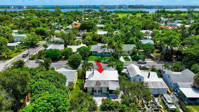 aerial view with a residential view and a water view