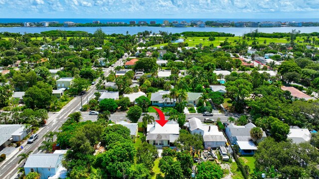 aerial view featuring a water view and a residential view