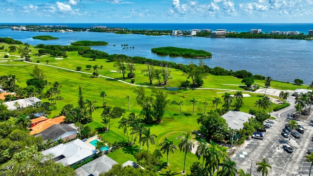 aerial view featuring view of golf course and a water view