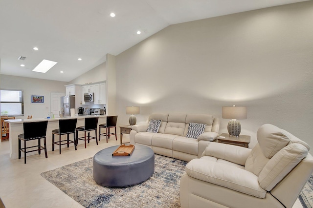 living room with vaulted ceiling