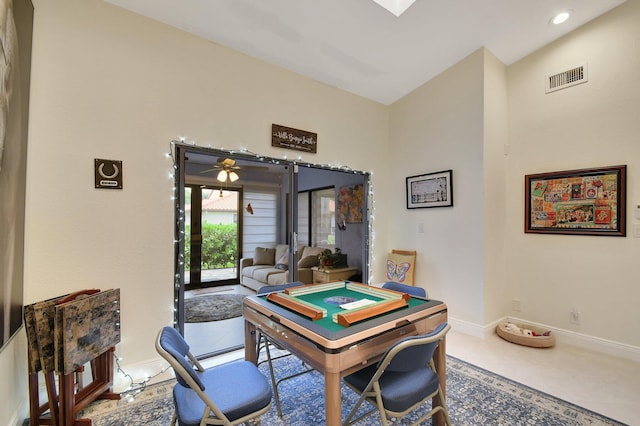 office area featuring lofted ceiling and ceiling fan