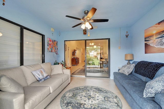 living room with light tile patterned floors and ceiling fan