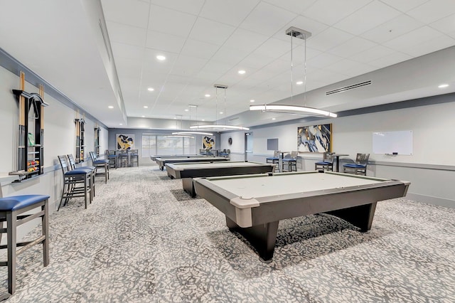 recreation room with pool table and light colored carpet