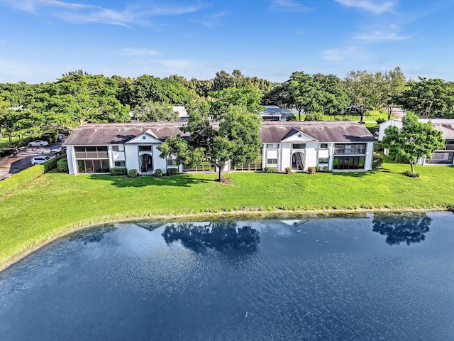 drone / aerial view with a water view