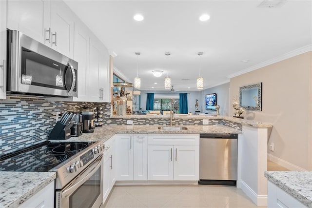 kitchen featuring decorative backsplash, light tile patterned floors, stainless steel appliances, kitchen peninsula, and white cabinets