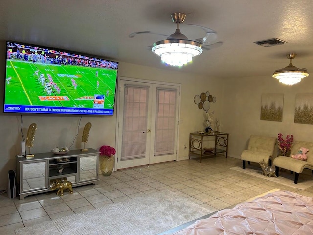 tiled living room with french doors