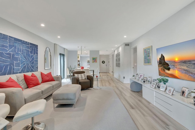 living room featuring light hardwood / wood-style floors