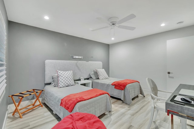 bedroom featuring light hardwood / wood-style flooring and ceiling fan