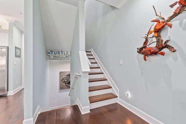 stairway featuring hardwood / wood-style floors