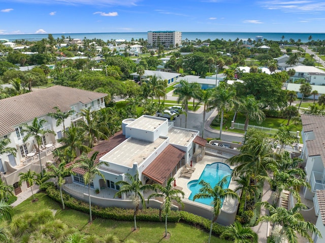 birds eye view of property featuring a water view