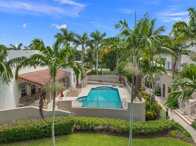 view of swimming pool with a patio