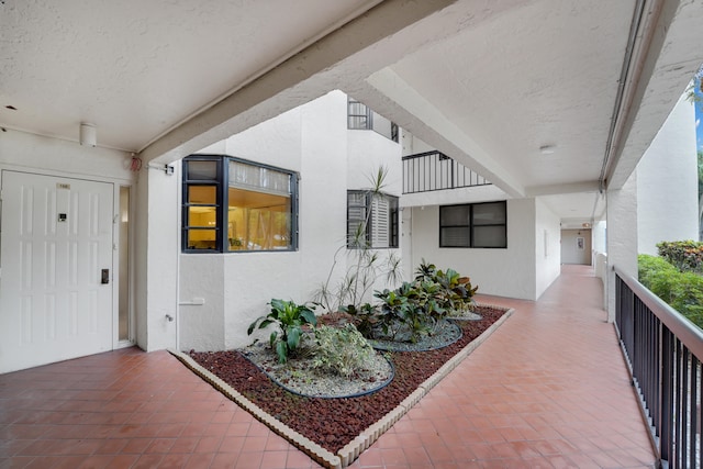 doorway to property featuring a balcony