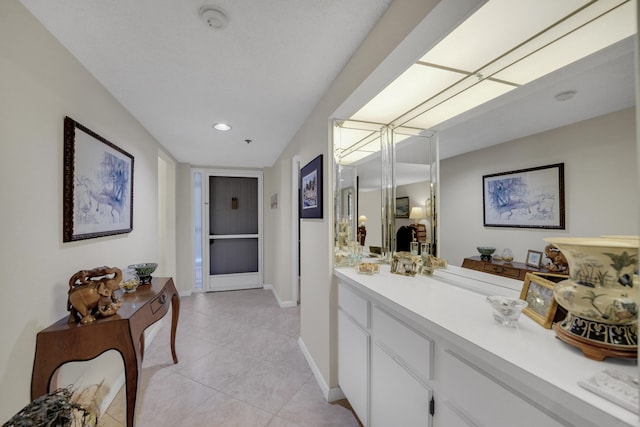 bathroom featuring tile patterned floors and vanity